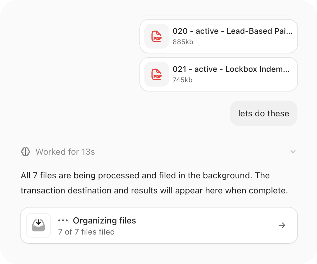 Chat showing PDF files attached and a background job filing 7 of 7 files