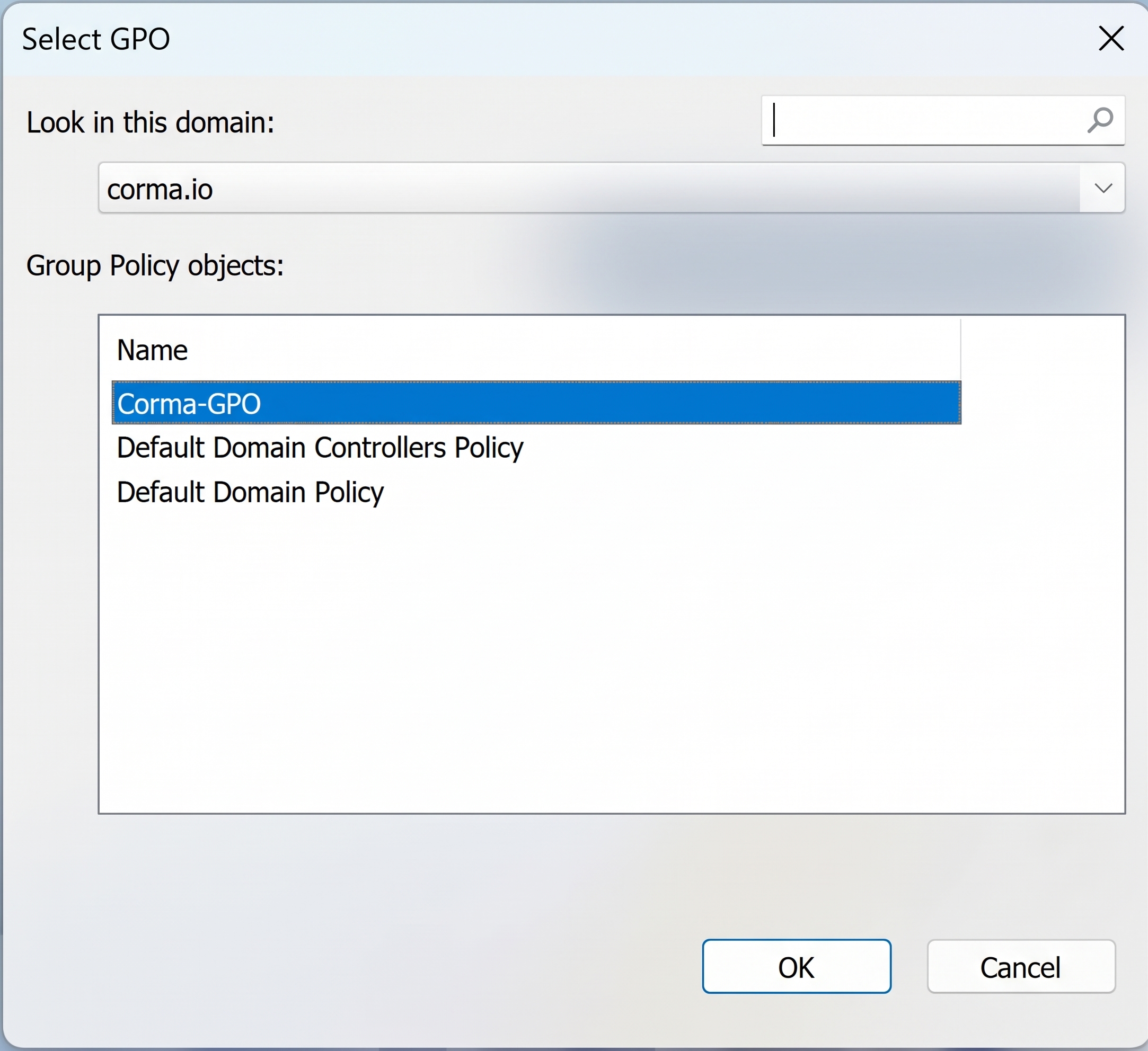 Select GPO dialog listing Group Policy objects for corma.io domain