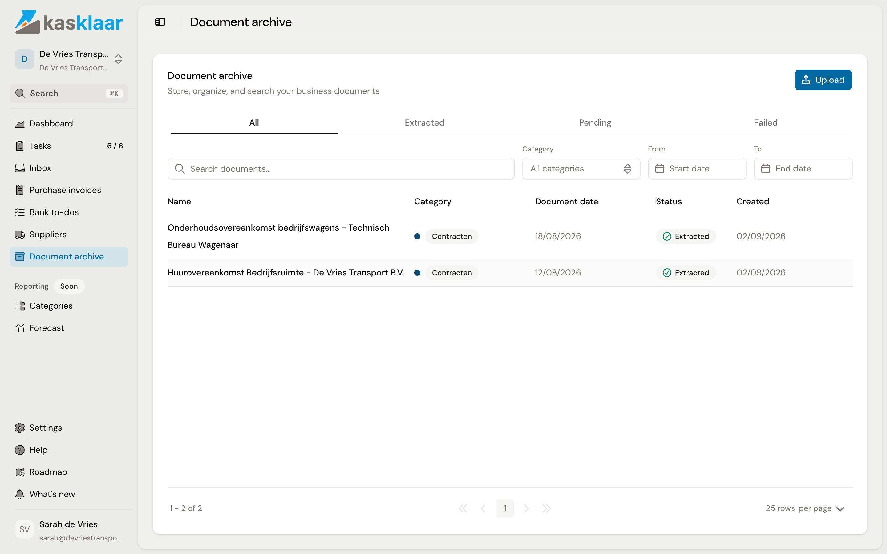 The Document archive with two contracts, each with category, document date and status Extracted